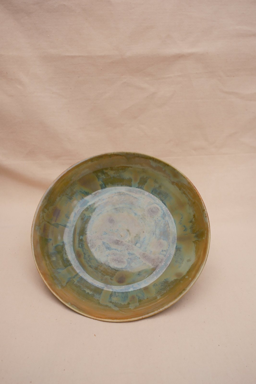 The plowl standing on edge, the glaze pattern seen face-on