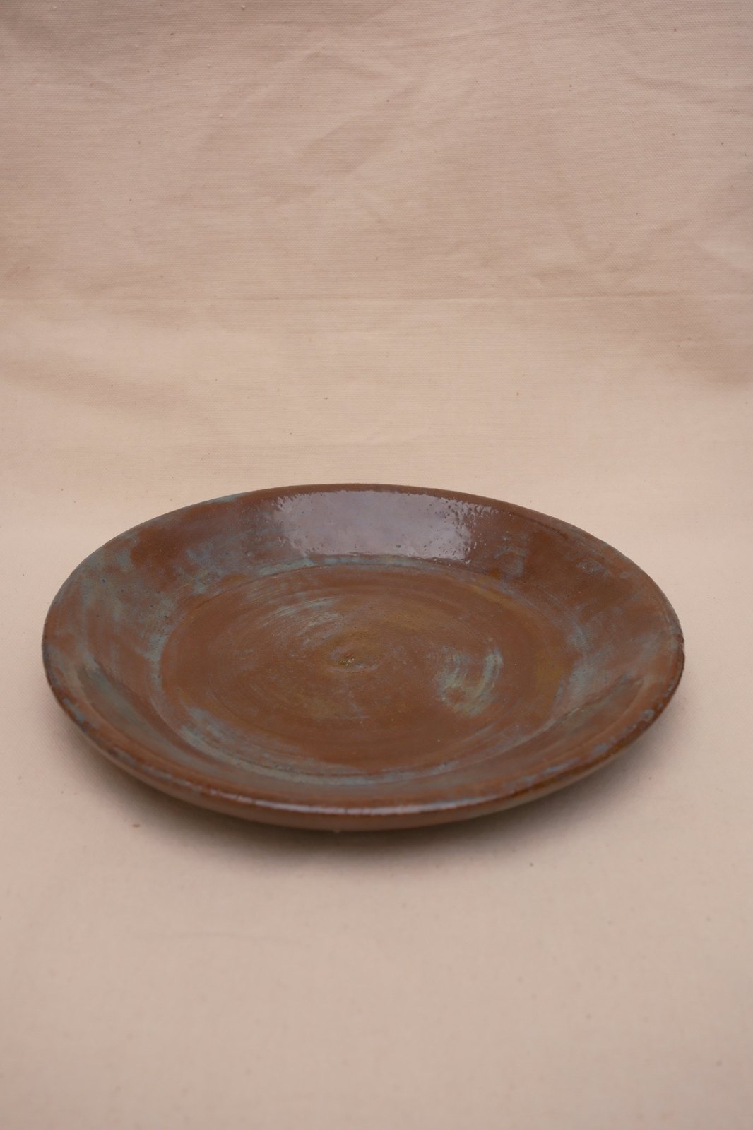 The plowl, No. 02: rust-brown glaze breaking to blue-grey