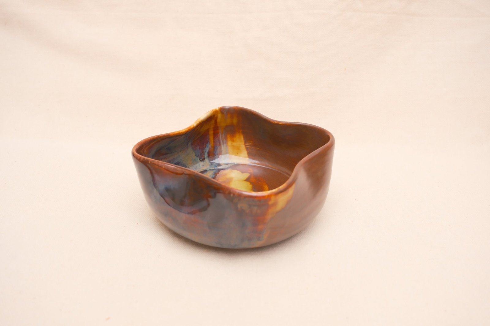 The wavy bowl on linen from a raised angle