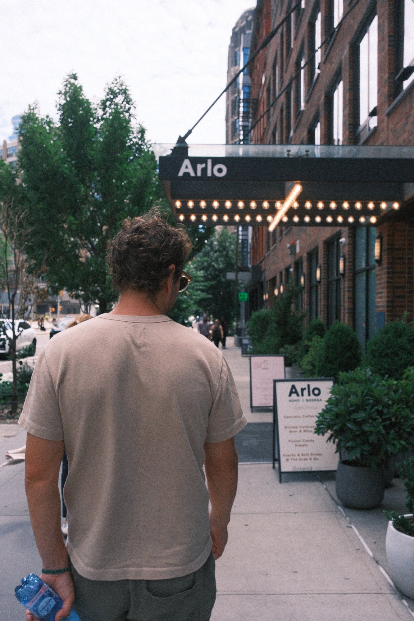 Walking past the marquee lights of the Arlo hotel in SoHo