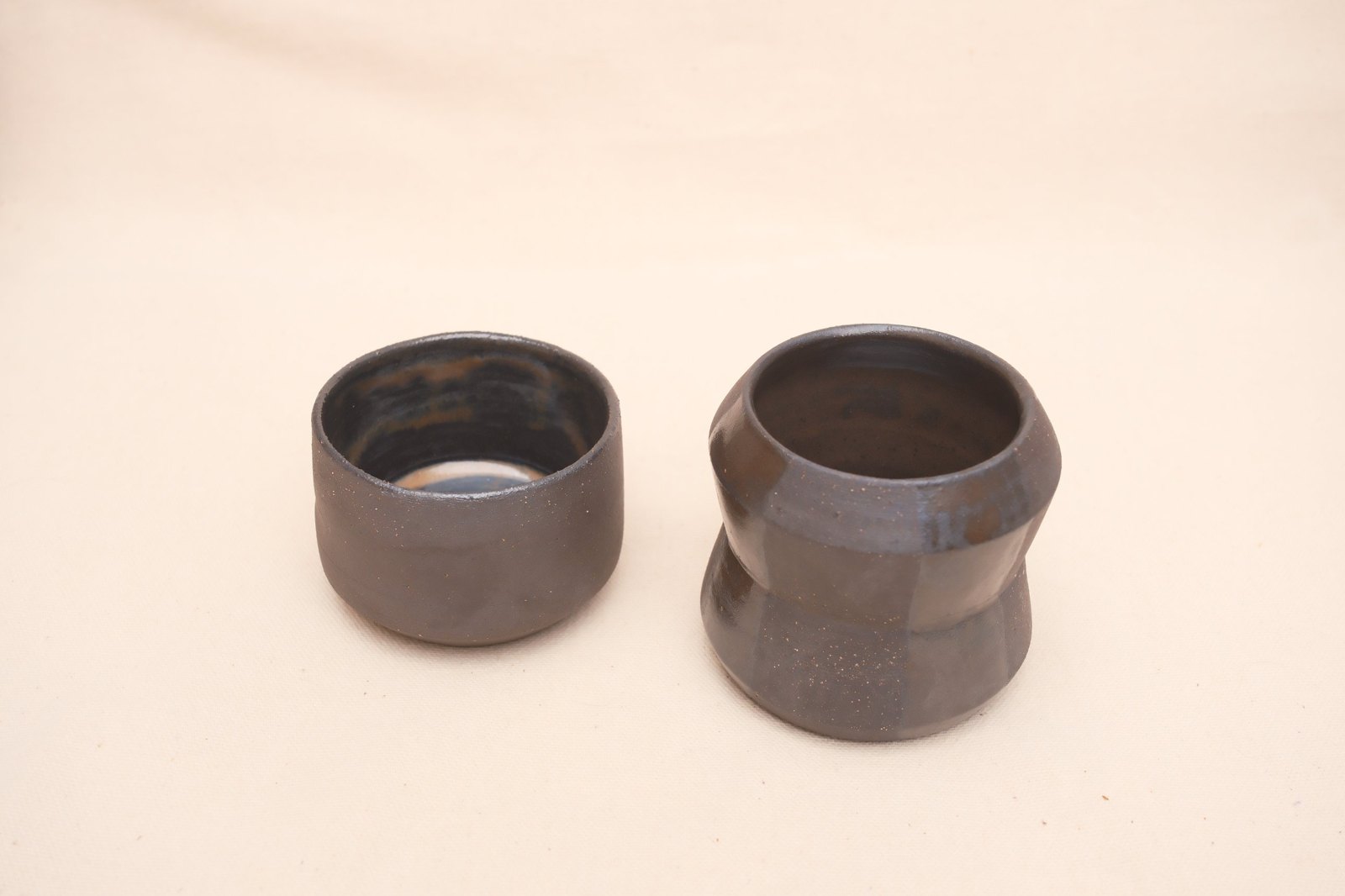 The two cups from above, glossy interiors showing