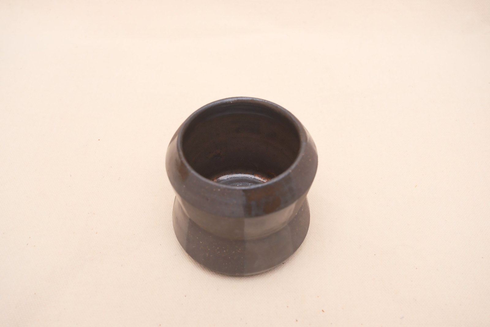 Looking into the cup from above at the glossy interior