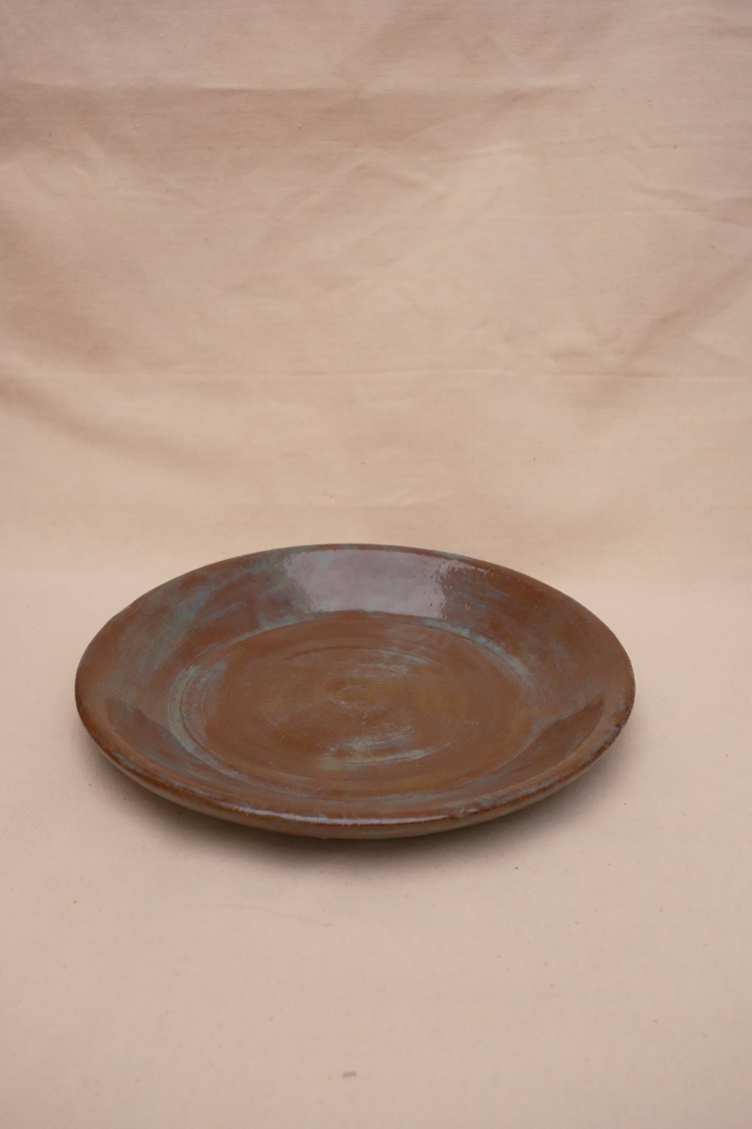 The plowl set back on a linen backdrop