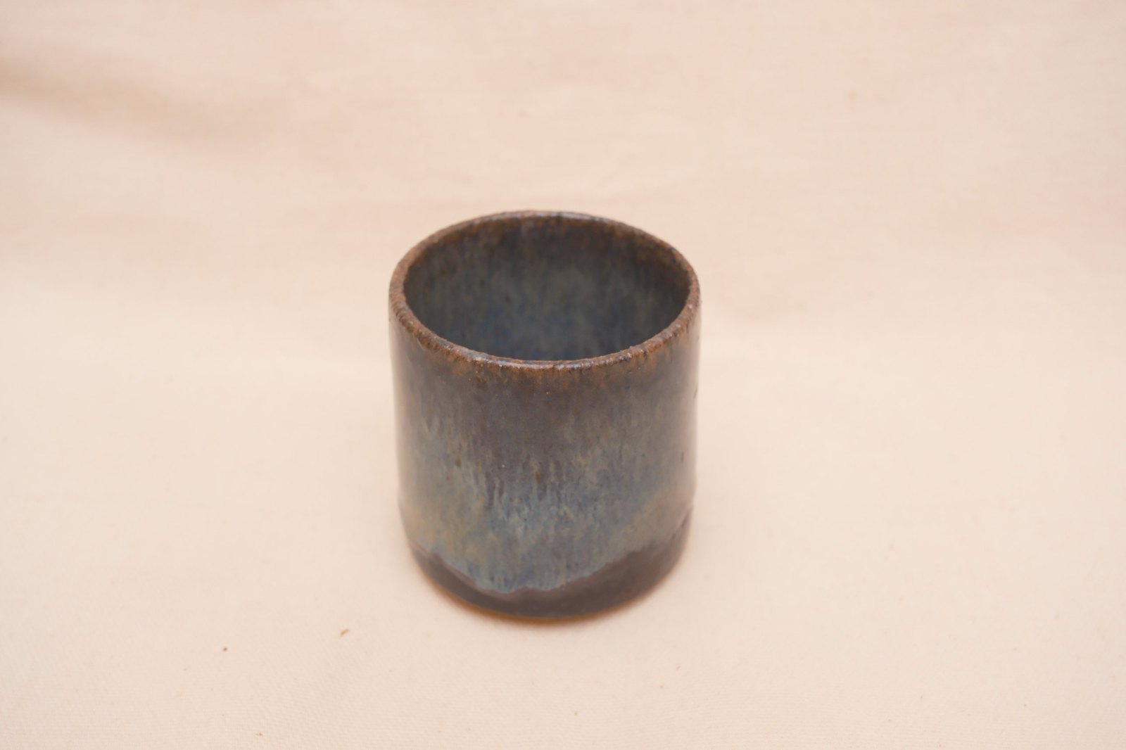 The second cup from a raised angle
